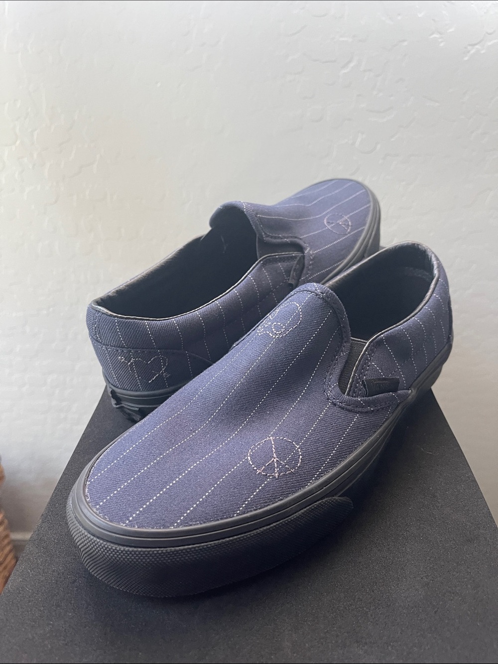 Woman’s Slip-On Canvas Shoes in Navy with Embroidered Peace Motif
